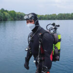 Taucher mit Corona Maske